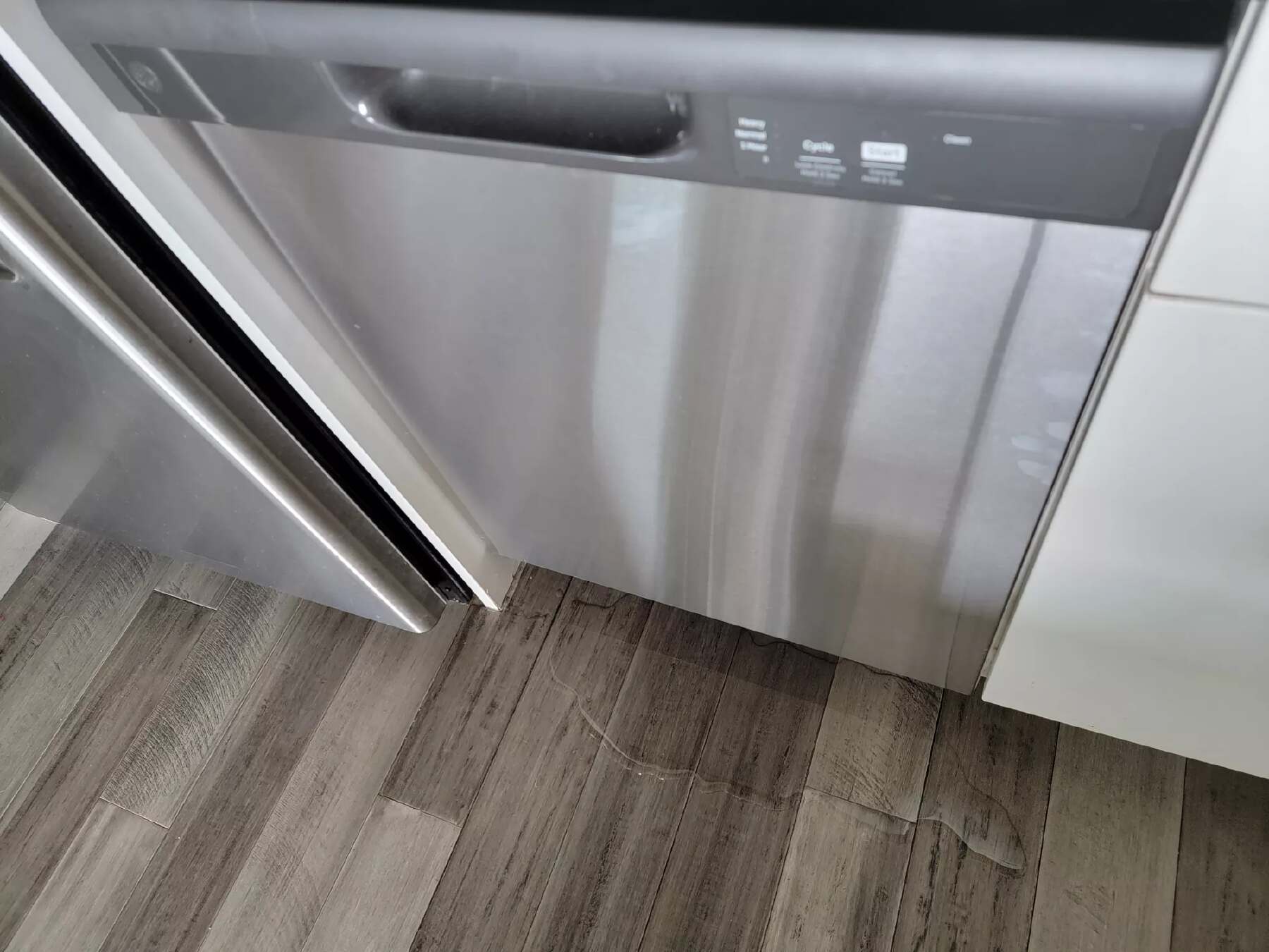 Leaking Dishwasher Repair Part of Thousands in Savings for Homeowner