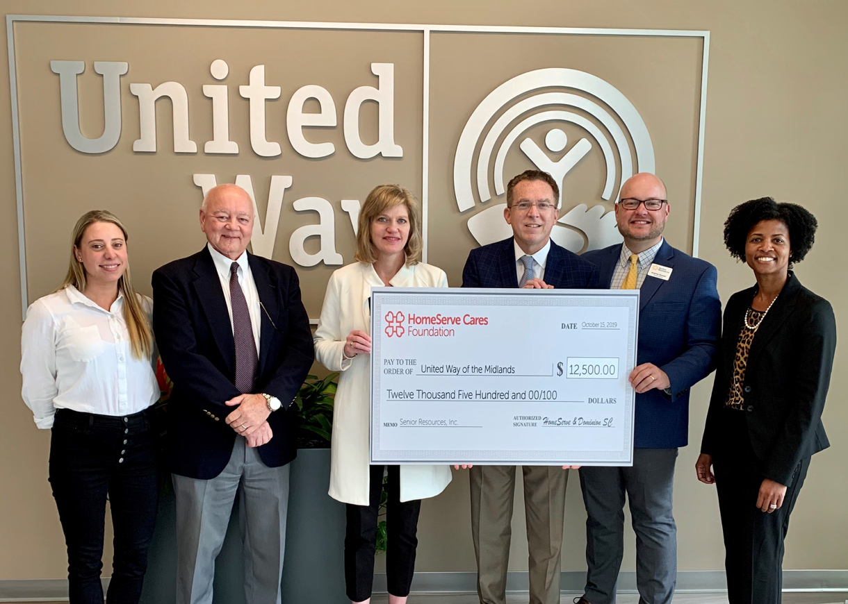 HomeServe presenting check to United Way of the Midlands
