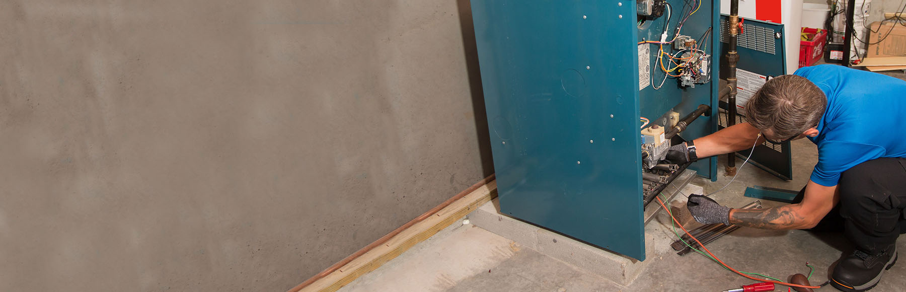 Man working on heater